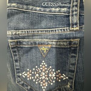 GUESS Women's Premium Denim with Embellished Pocket, cropped. Size 30.